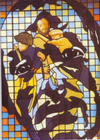 Vitrail du visage de Saint Jean de Dieu avec l'image incluse des enfants à sauver. Vitrail du visage de Saint Jean de Dieu avec l'image incluse des enfants à sauver.